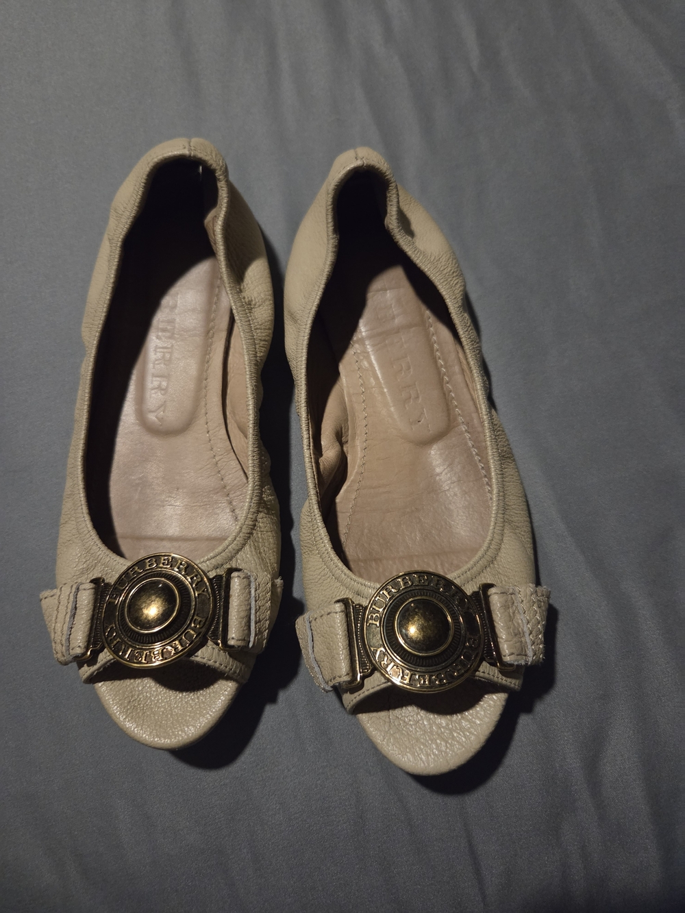 Burberry Beige Flats Metal Medallion Logo
